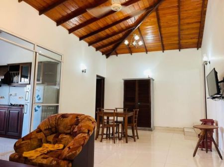 Modern 2-bedroom annex with balcony and fully furnished living space